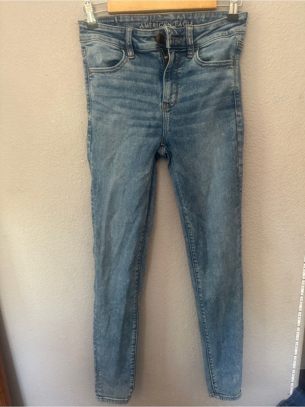 American Eagle Outfitters faded blue high-rise skinny jeans